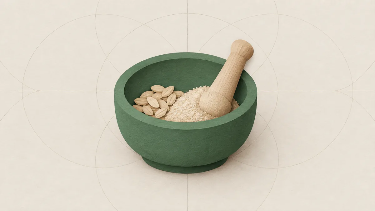 A low green cut-paper mortar holding grain and pale meal, a pestle resting in it, on warm off-white paper.
